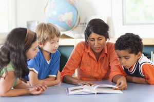 teacher-reading-to-students