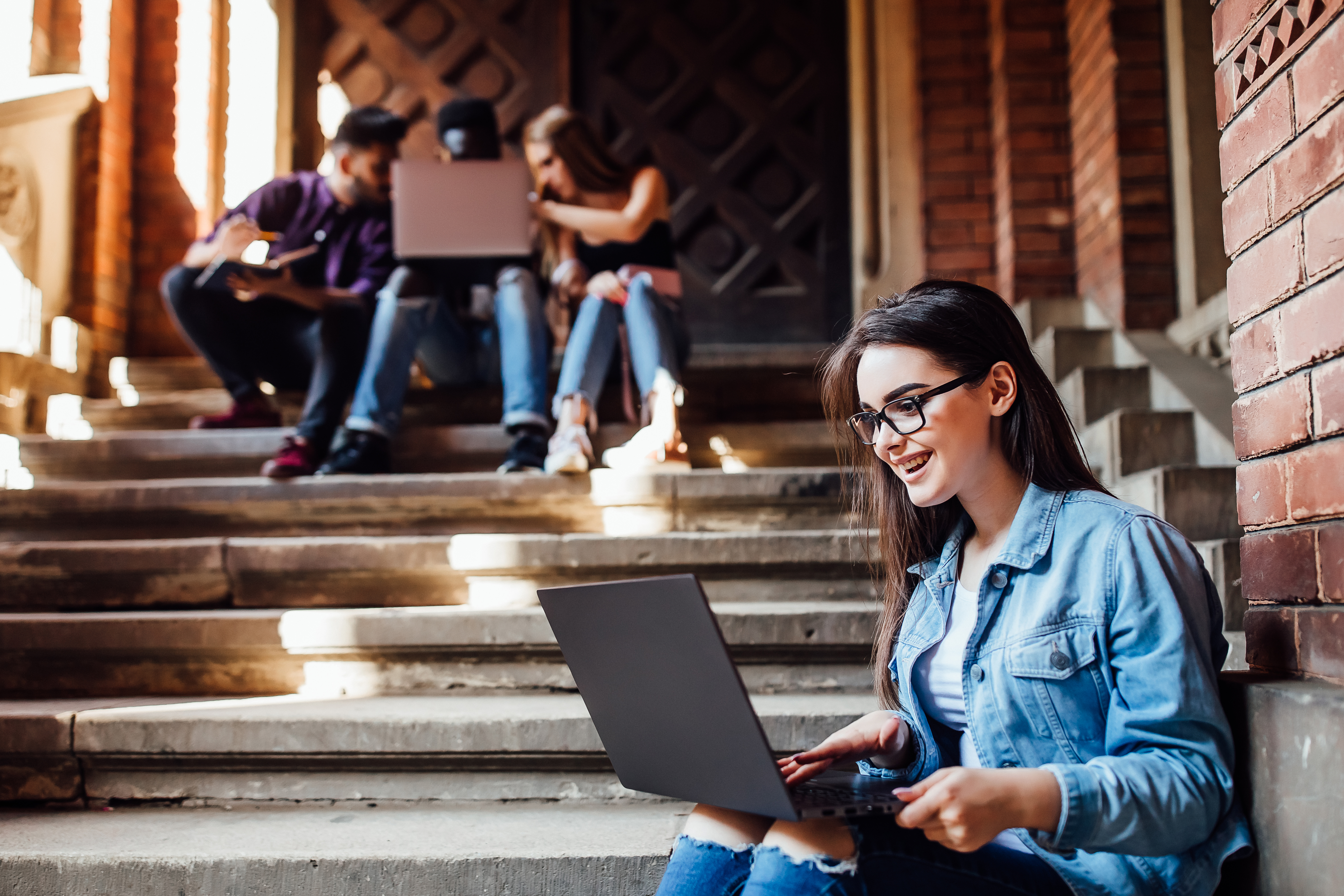 College girl working with laptop after lessons. Rest education and relax concept.