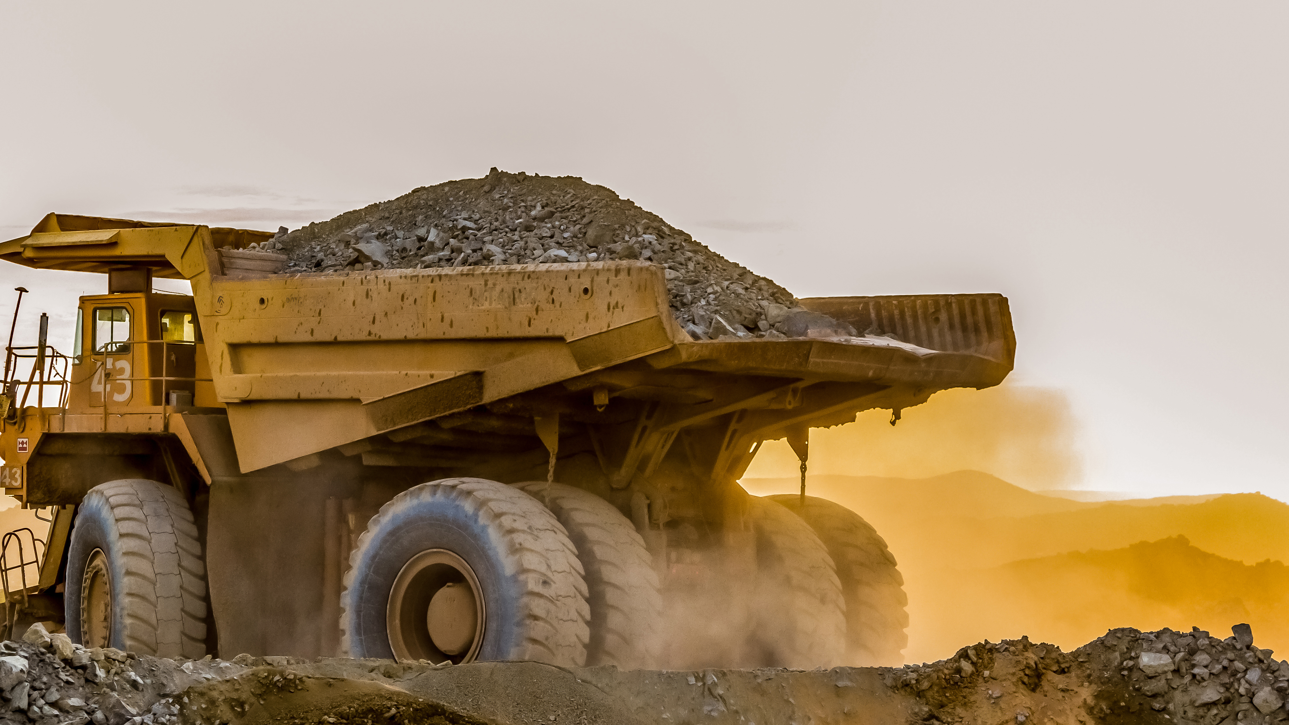 A large truck carrying sand on a platinum mining site in Africa